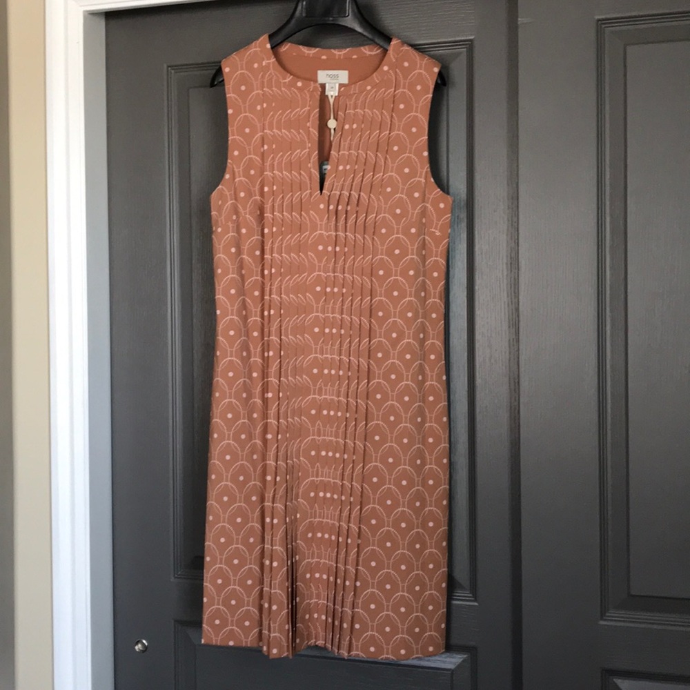 Sleeveless rust colored pleated midi dress